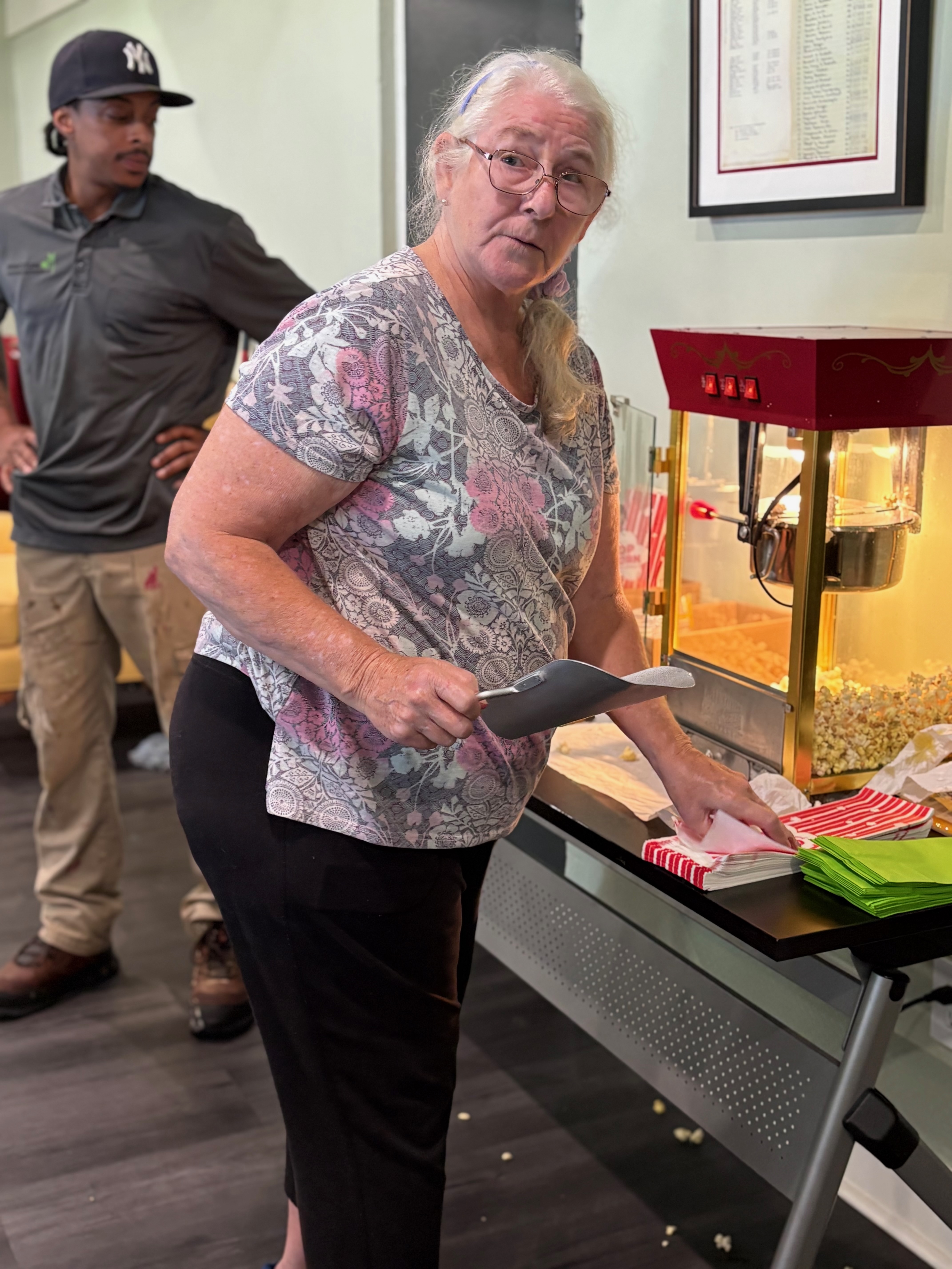 Image of resident getting popcorn